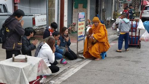 People on street in city