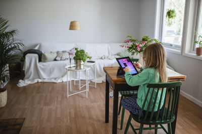 Girl using digital tablet