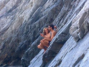 Young couple on rock