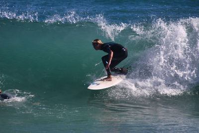 Man surfing in sea