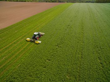 High angle view of tractor in agricultural field