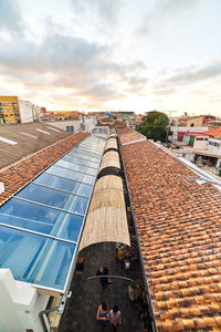 High angle view of buildings in city against sky