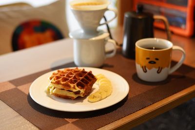 High angle view of breakfast served on table