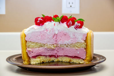 Close-up of half cake in plate