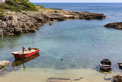 High angle view of boats moored on beach