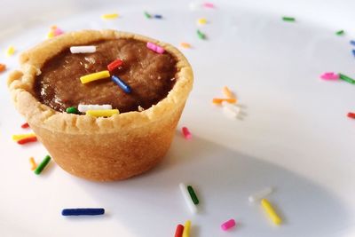 Close-up of dessert on white background