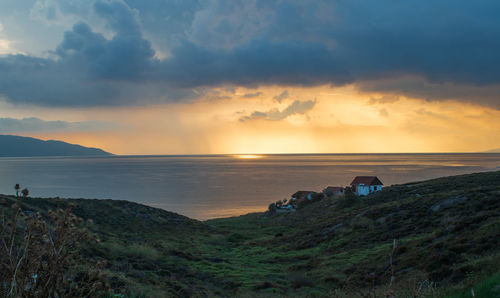 Scenic view of sea against sky during sunset