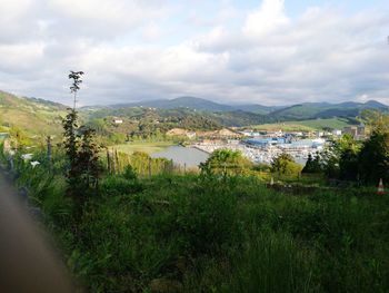 Scenic view of townscape against sky