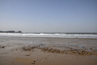 Scenic view of sea against clear sky
