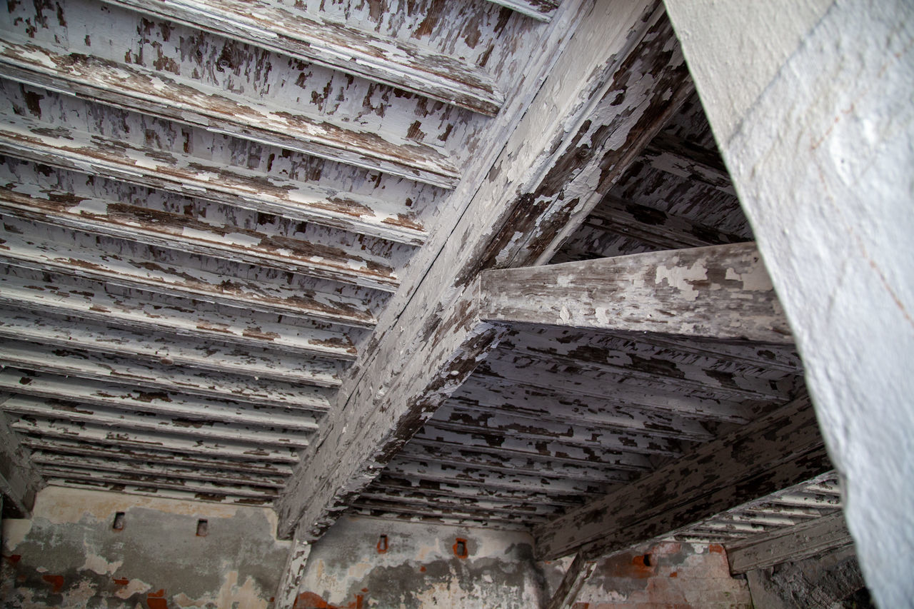 LOW ANGLE VIEW OF ABANDONED BUILDING