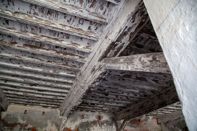 Low angle view of old ceiling of building