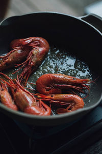 Spot prawns shrimp seafood in butter garlic parsley camping outdoors