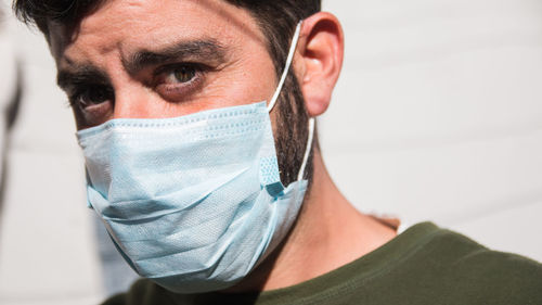 Man wearing face mask outdoors