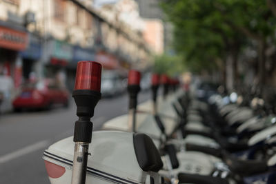 Close-up of vehicles on road