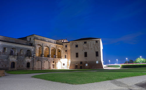 Building against blue sky at night