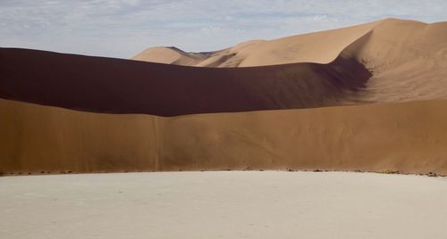 Scenic view of desert against sky