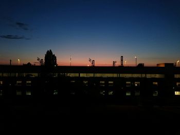 View of illuminated buildings at dusk