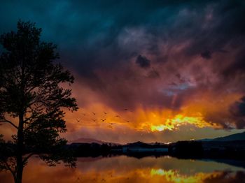 Scenic view of dramatic sky during sunset