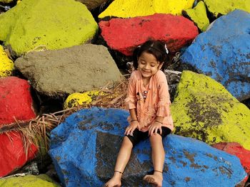 Full length portrait of smiling girl