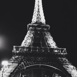 Low angle view of tower at night