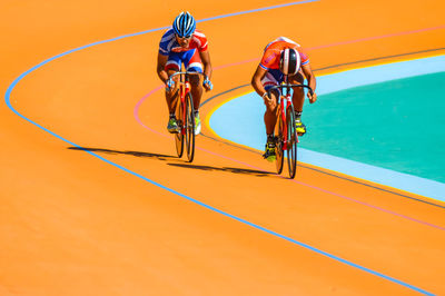 People riding bicycle