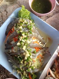 High angle view of chopped vegetables in bowl on table