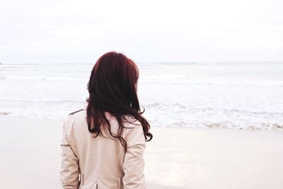 Woman standing on beach