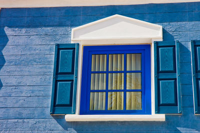 Close-up of window on wall of building