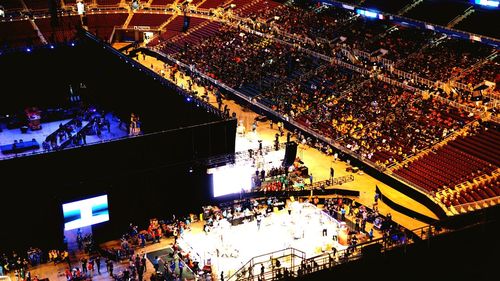 High angle view of crowd at illuminated city at night