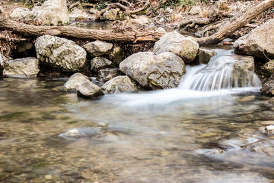 Stream flowing through rocks