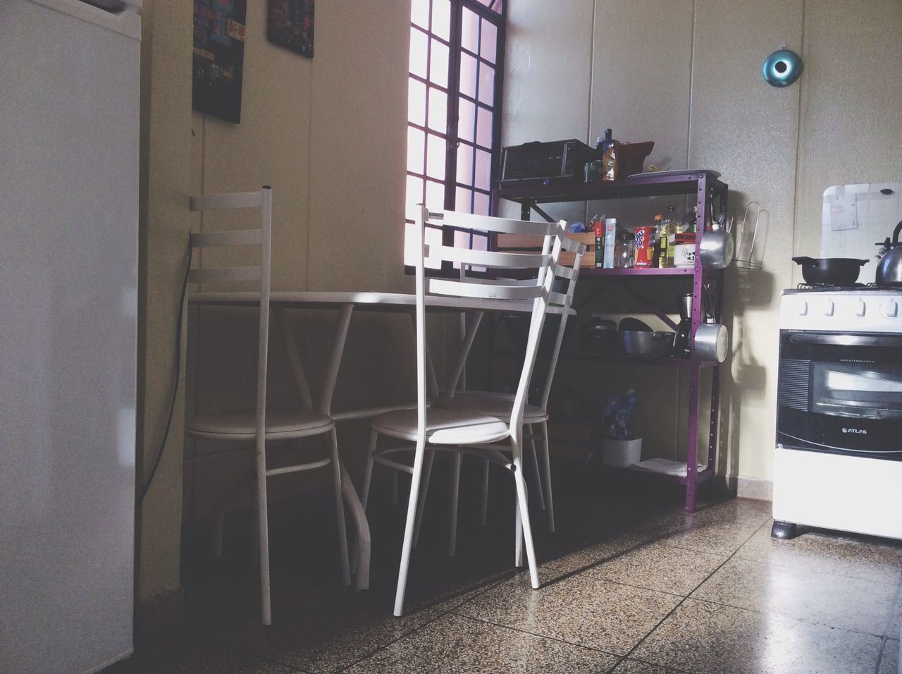 indoors, chair, absence, empty, architecture, window, table, home interior, built structure, furniture, house, domestic room, door, flooring, no people, wall, day, living room, room, seat