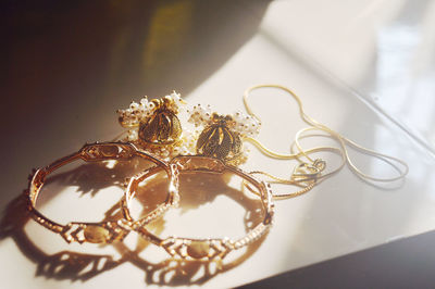 Close-up of jewelry on table