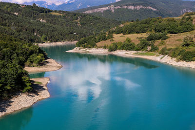 High angle view of lake amidst trees