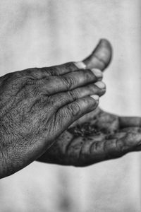 Cropped image of man clapping hands