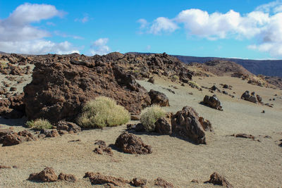 Scenic view of mountains against clear blue sky