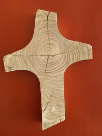 Close-up of wooden cross on wall