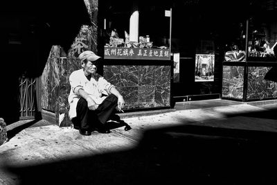 Woman sitting on bench