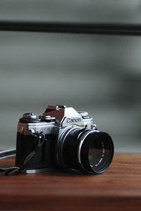 Close-up of camera on table