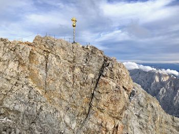 Low angle view of rocks against sky