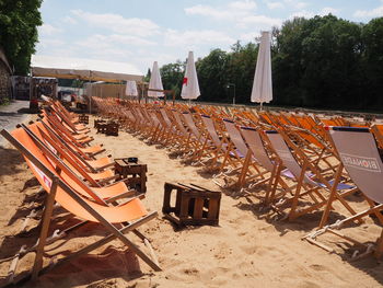 Row of trees against sky