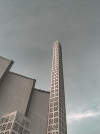 Low angle view of modern building against sky