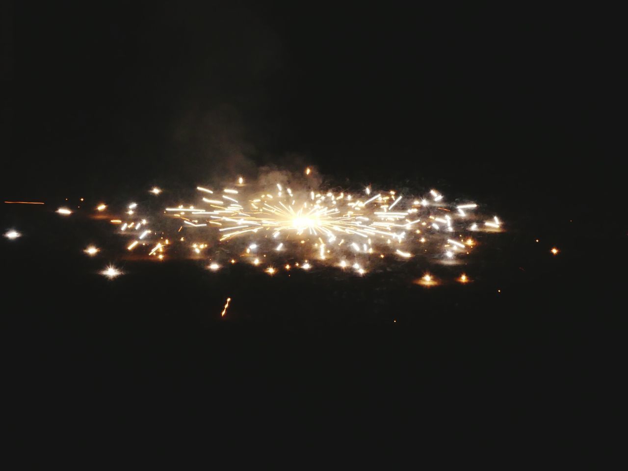 FIREWORK DISPLAY IN SKY AT NIGHT