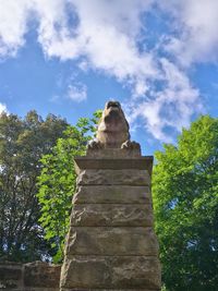 Low angle view of statue against sky