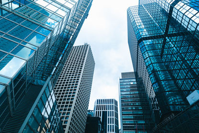 Low angle view of modern buildings against sky