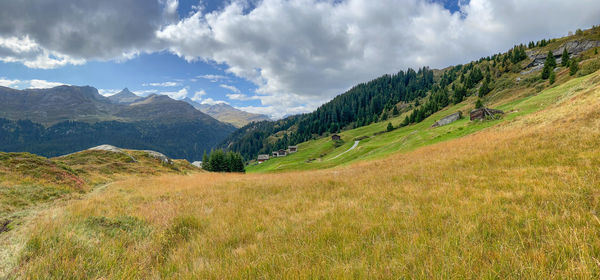 Panoramic view of landscape and mountains against sky