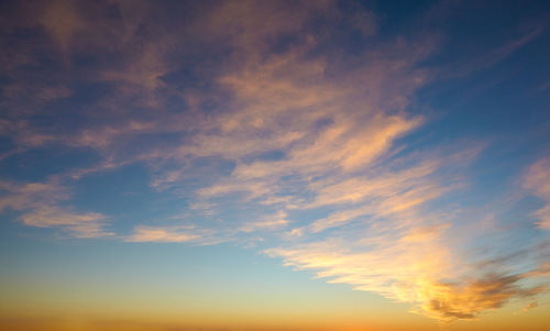 Low angle view of dramatic sky during sunset