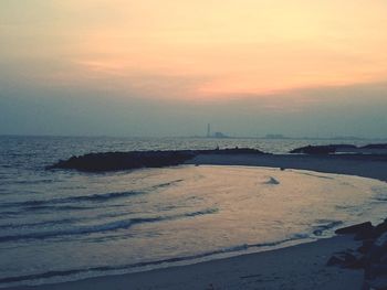 Scenic view of sea against sky during sunset