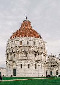 Facade of historical building against sky