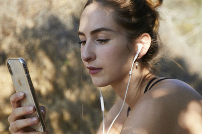 Young woman using mobile phone