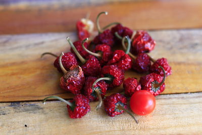 High angle view of cherry tomato with spice on table